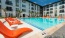 a swimming pool in front of a building