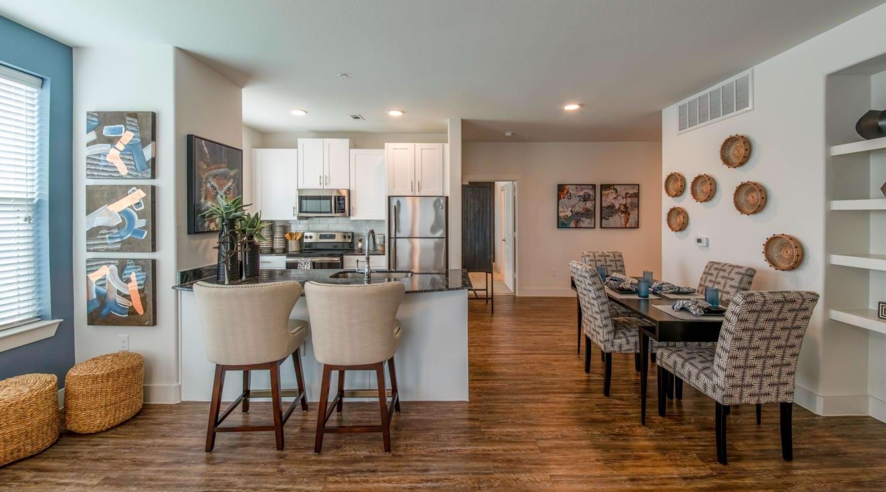 a large kitchen with a dining table