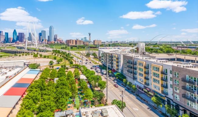Settle into comfort at Cypress at Trinity Groves a city with a river running through it